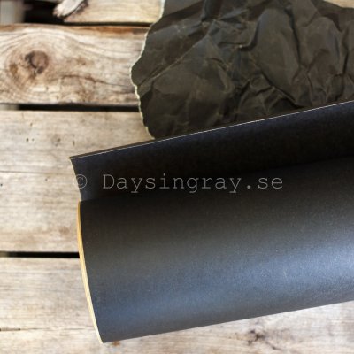 Zoom bild av Vaxat kraftpapper Blompapper Svart